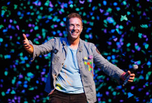 Chris Martin Aucklandissa -taustakuva — OLED Taustakuvat