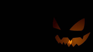 Halloween-loistava kurpitsa taustakuva