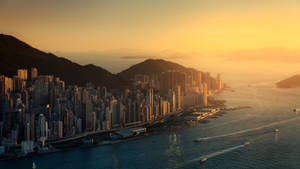 Kaunis Hongkongin kaupunkimaisema auringonlaskulla -taustakuva — 1600x900 Taustakuvat