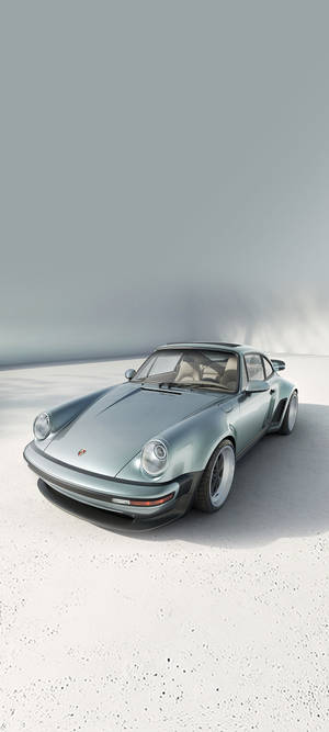 Hopeinen Porsche 911 — Pixel 10 Taustakuvat
