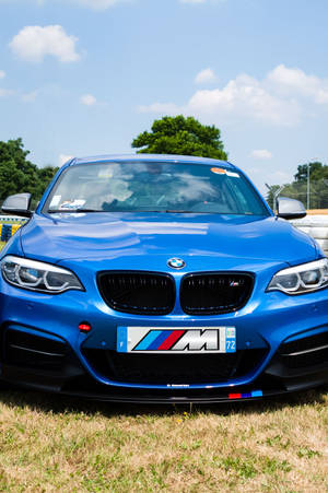 Kaunis sininen BMW kilparadalla — Xiaomi Pad Taustakuvat