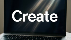 Minimalistinen MacBook-taustakuva, jossa lihavoitu sana 'Create'.