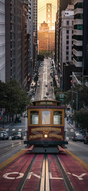 San Francisco köysirata puhelimen taustakuva auringonlaskussa — iPhone 16 Pro Max Taustakuvat