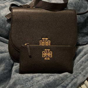 Tory Burch -laukun ja -clutchin taustakuva — Pixel Watch 3 Taustakuvat