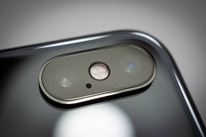 Avaruudenharmaa iPhone Xs -taustakuva
