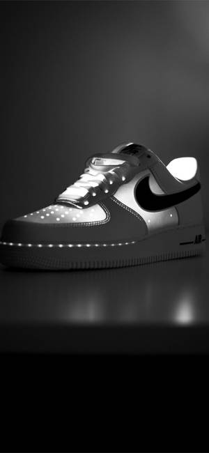 Valaistu Nike iPhone plain — iPhone 16 Pro Max Taustakuvat